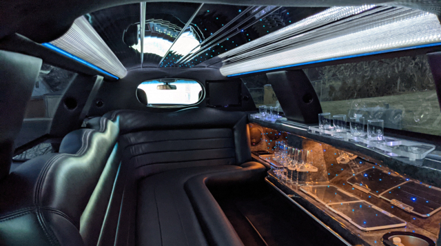 A modern black limousine.
